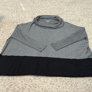 Scrunched turtle neck blouse.